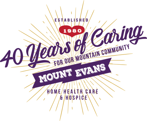 Graphic text logo from Mount Evans showing "Forty Years of Caring for Our Mountain Community"